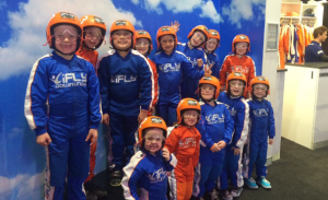 Group of kids geared up and ready to fly