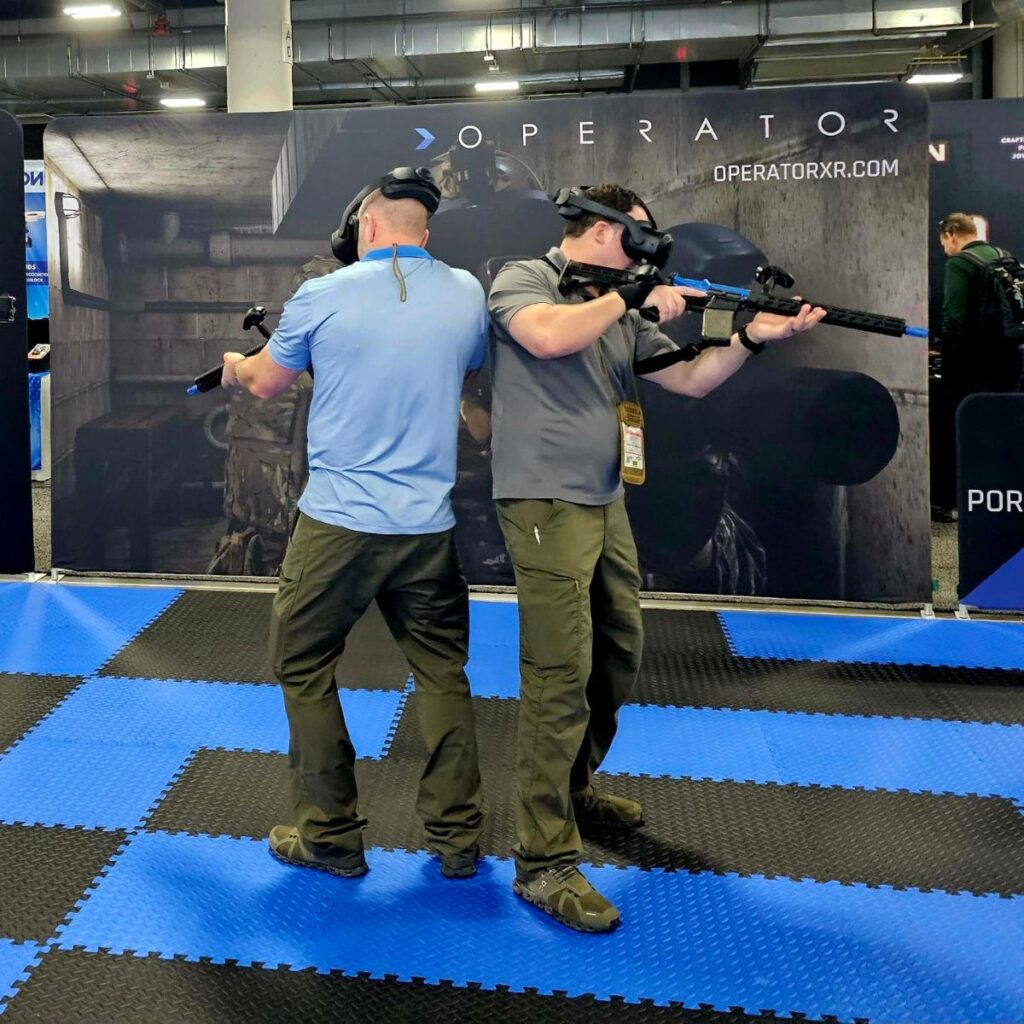 Operator XR display at SHOT SHOW 2025. 2 military personnel experiencing the OP-2 system via live demonstration.
